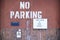 Keep clear at all times no parking 24 access required sign at factory entrance door