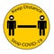 Keep Distance Sign on yellow with people in masks on words separating people for public health and safety during Coronavirus COVI