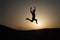 Keep moving. Silhouette man motion jump in front of sunset sky background. Daily motivation. Healthy lifestyle personal