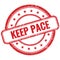 KEEP PACE text on red grungy round rubber stamp