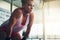 Keep pushing and believing in yourself. a sporty young woman taking a break while working out at the gym.