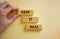 Keep it real symbol. Wooden blocks with words `keep it real` on beautiful white background. Businessman hand. Business, keep it