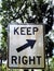 Keep Right Arrow Metal Sign White and Black