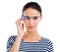 Keep your eyes open. Studio portrait of an attractive young woman using smartglasses against a white background.