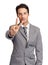 Keeping business tidy. A handsome young executive showing the peace sign while isolated on white.