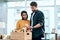 When keeping healthy comes at a cost. Shot of a young couple going through their receipts at home after buying groceries