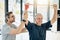 Keeping his strength up. a friendly physiotherapist helping his mature patient to stretch at a rehabilitation center.