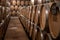 Keeping for years of dry red wine in new oak barrels in caves in Burgundy, made from pinot noir grape