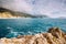 Kefalonia cliff coastline, with rough sea in late summer. Greece vacation trip