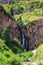 Kegeti waterfall. Background for tourism and travel. Summer landscape. Kegeti Gorge, Kyrgyzstan