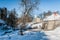 Keila-Joa, Estonia - March 5, 2018: Keila-Joa manor Schloss Fall standing on hillside and Keila-Joa Hydroelectric Power Plant in