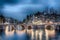 Keizersgracht inersection bridge view of Amsterdam canal and historical houses during twilight time, Netherland