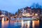 Keizersgracht intersection bridge view of Amsterdam canal and historical houses during twilight time, Netherland