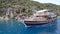 Kekova, Turkey - June 03, 2019: People on pleasure tourist yacht sailing near the island of Kekova in Turkey