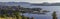 Kelowna British Columbia skyline and Okanagan Lake with the R W Bennett Bridge from Knox Mountain at sunset