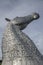 The Kelpies, horse-head sculptures, Scotland; sunny day.