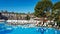 Kemer, Antalya, Turkey - July 08, 2021: Alva Donna World Palace, beautifully arranged sun loungers and umbrellas by the pool