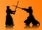 Kendo fighters in traditional clothes silhouette
