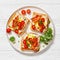 Kentucky Hot Brown open sandwiches on a plate