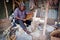 KENYA, AFRICA - DECEMBER 10: A man carving figures in wood.