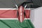 Kenya fabric flag crepe and crease with white space.