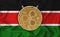 Kenya flag, ripple gold coin on flag background. The concept of blockchain, bitcoin, currency decentralization in the country. 3d-