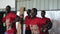 KENYA, KISUMU - MAY 20, 2017: African teenagers dancing on a stage together, showing movements.