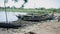 KENYA, KISUMU - MAY 20, 2017: Fishermen sitting in boats on the shore of the sea in Africa, preparing for the working