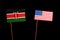 Kenyan flag with USA flag isolated on black