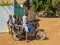 Kenyan man with four children on motorbike