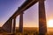 Kenyan Sunrise Sunset Landscape Concrete Pillars SGR Standard Gauge Railways Bridge In Nairobi National Park Kenya East Africa