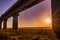 Kenyan Sunrise Sunset Landscape Concrete Pillars SGR Standard Gauge Railways Bridge In Nairobi National Park Kenya East Africa