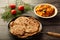 Kerala foods- Top view wheat paratha with dum aloo.