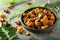 Kerala recipe- Bowl of spicy mutton curry.
