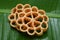 Kerala snack Achappam or rosette cookies fried snack for Onam