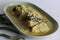 Kerala style, coconut based Pomfret fish curry. Yellow coloured fish curry