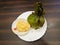 Kerala Style Tasty Biryani Wrapped In Banana Leaf And Pappadam In Plate. Selective Focus