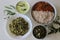 Kerala style veg meals including boiled matta rice, red carrot thoran, beans stir fry, green gram bottle gourd thoran and tempered