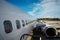 Kerkyra, Greece - 09 29 2022: View in Corfu Airport On White Aircraft Tail of Boeing in Sunny Weather. Plane Is Ready For Boarding