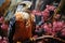 Kestrel bird sitting on a branch with sakura flowers