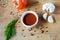 Ketchup in a bowl, fresh tomato, dill sprig and whole tomato close-up