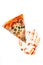 Ketchup soiled hand is holding a slice of pizza. creative concept of fast food. White background. Top wiev. Copy space