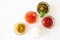 Ketchup, sweet chili sauce, pesto, french mustard and mayonnaise in glass bowls on a white background, top view. Various seasoning