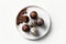 Keto Chocolate Truffles On Plate, White Background. Generative AI