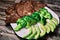 Keto diet based on beef steak, broccoli and avocado