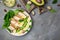 Ketogenic diet food, chicken fillet, quail eggs, avocado, spinach, walnut. healthy meal concept on a light background, banner,