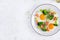 Ketogenic/paleo diet. Fried eggs, salmon, broccoli and microgreen.
