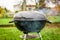 Kettle Charcoal BBQ Barbecue Grill in garden or backyard