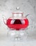 A kettle filled with hibiscus petals.