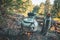 Kettle, gas burner and silicone mug close-up. Hiking in the forest